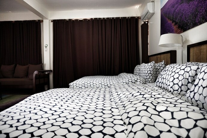 Imagen de la habitación del Hotel Aloe de Diniwid. Foto 23