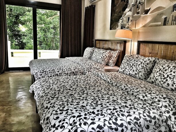 Imagen de la habitación del Hotel Aloe de Diniwid. Foto 33