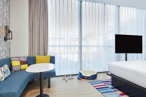 Imagen de la habitación del Hotel Aloft Beijing Huairou, Huairou. Foto 15