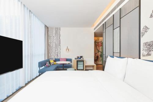 Imagen de la habitación del Hotel Aloft Beijing Huairou, Huairou. Foto 16