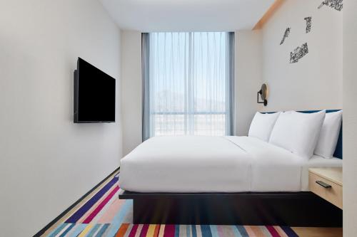 Imagen de la habitación del Hotel Aloft Beijing Huairou, Huairou. Foto 20