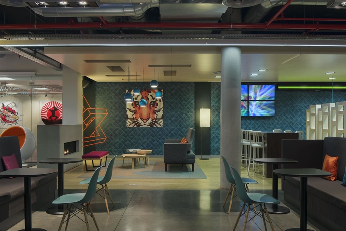 Imagen del bar/restaurante del Hotel Aloft Brussels Schuman. Foto 4