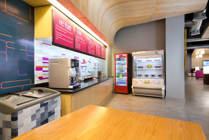 Imagen del bar/restaurante del Hotel Aloft Cancun. Foto 3