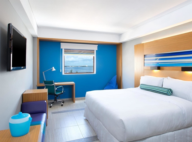 Imagen de la habitación del Hotel Aloft Cancun. Foto 8