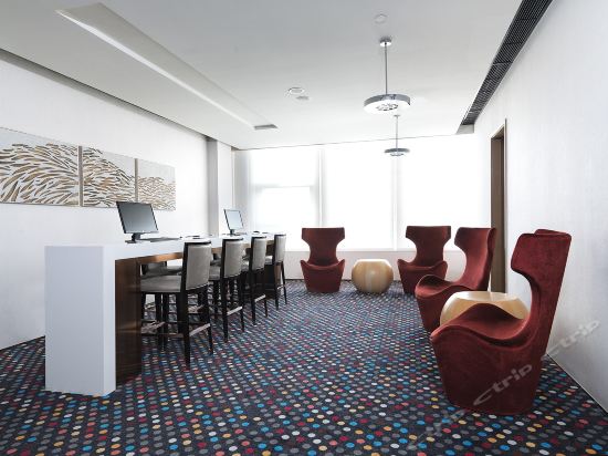 Imagen de los interiores del Hotel Aloft Dalian. Foto 19