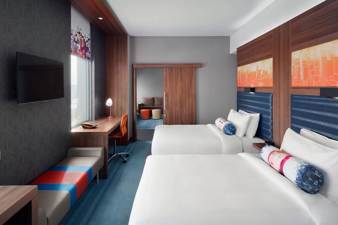 Imagen de la habitación del Hotel Aloft Dhahran. Foto 19