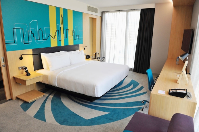 Imagen de la habitación del Hotel Aloft Dubai Creek. Foto 3