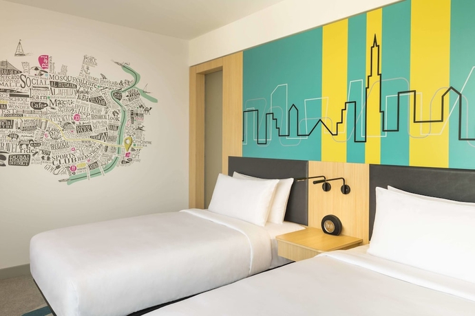 Imagen de la habitación del Hotel Aloft Dubai Creek. Foto 17