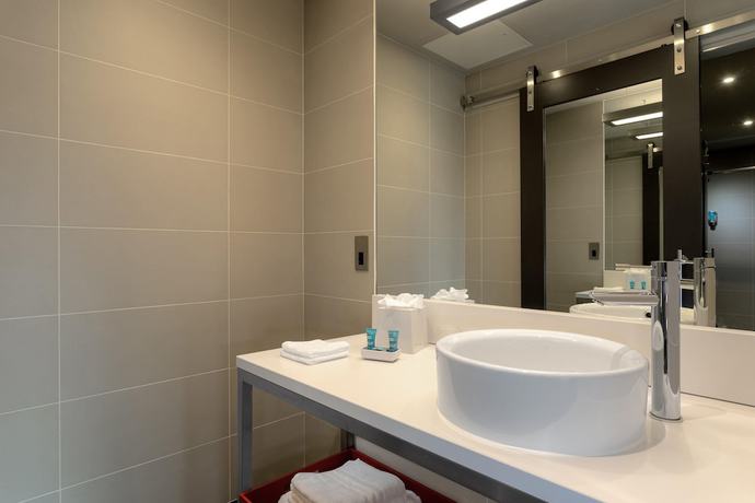 Imagen de la habitación del Hotel Aloft Dublin City. Foto 4