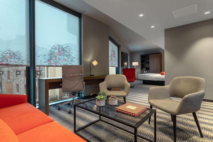 Imagen de la habitación del Hotel Aloft Dublin City. Foto 12