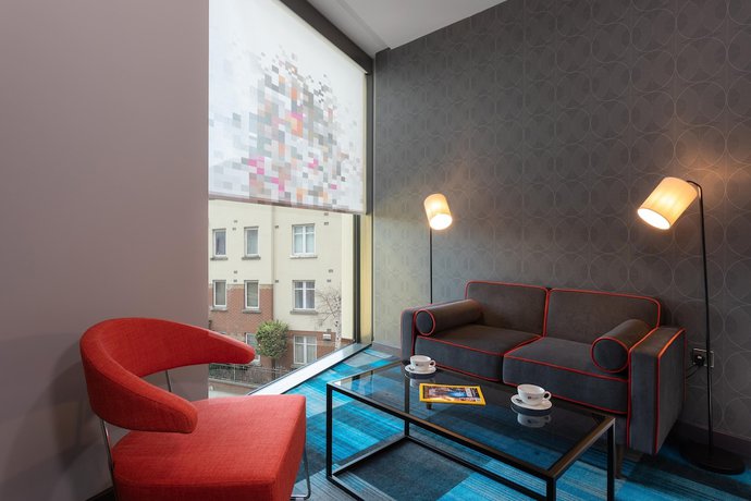 Imagen de la habitación del Hotel Aloft Dublin City. Foto 16