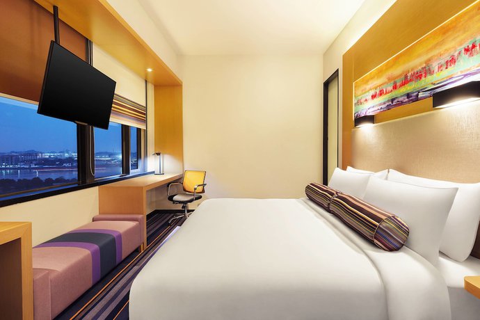 Imagen de la habitación del Hotel Aloft Guangzhou University Park. Foto 4