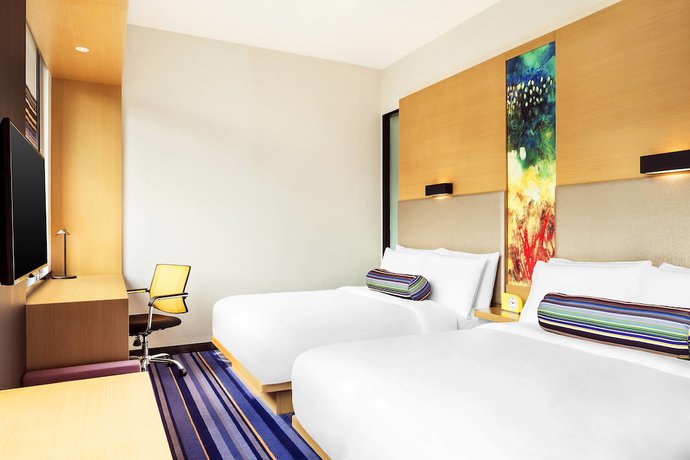 Imagen de la habitación del Hotel Aloft Guangzhou University Park. Foto 8