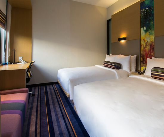 Imagen de la habitación del Hotel Aloft Guangzhou University Park. Foto 9