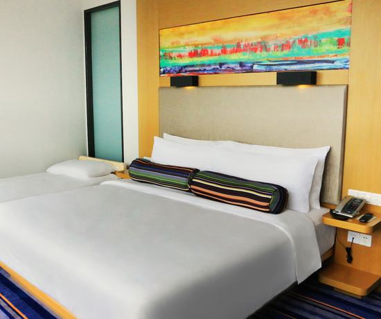 Imagen de la habitación del Hotel Aloft Guangzhou University Park. Foto 16