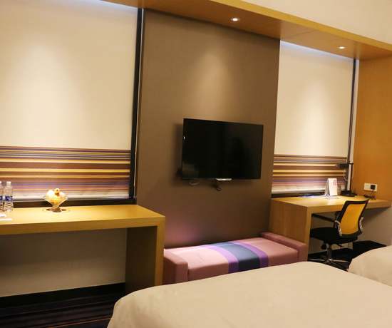 Imagen de la habitación del Hotel Aloft Guangzhou University Park. Foto 17