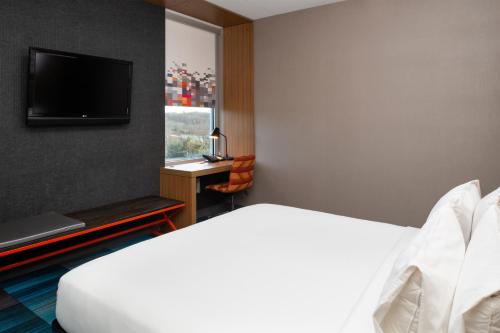 Imagen de la habitación del Hotel Aloft Lexington. Foto 19