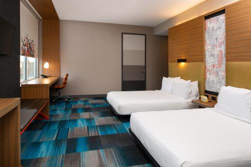 Imagen de la habitación del Hotel Aloft Lexington. Foto 20