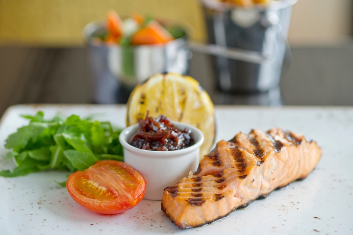 Imagen del bar/restaurante del Hotel Aloft London Excel. Foto 7