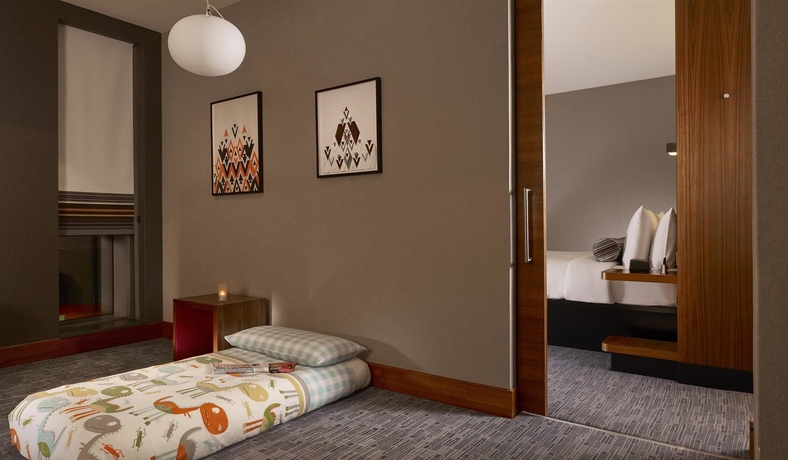 Imagen de la habitación del Hotel Aloft London Excel. Foto 13