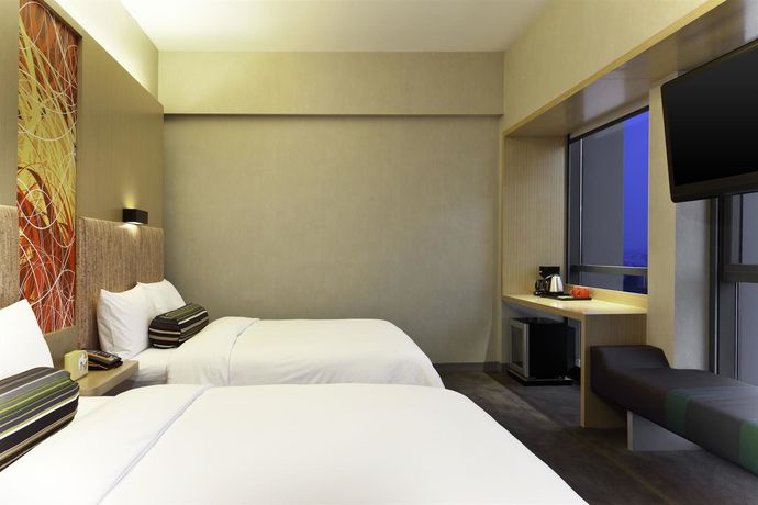 Imagen de la habitación del Hotel Aloft Nanhai Foshan. Foto 7