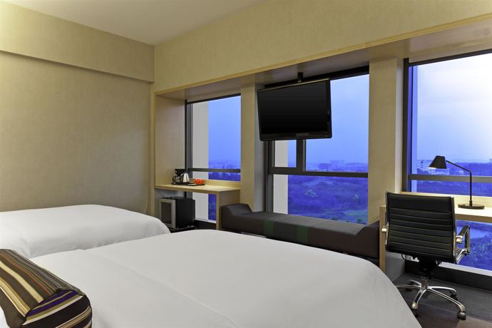 Imagen de la habitación del Hotel Aloft Nanhai Foshan. Foto 12