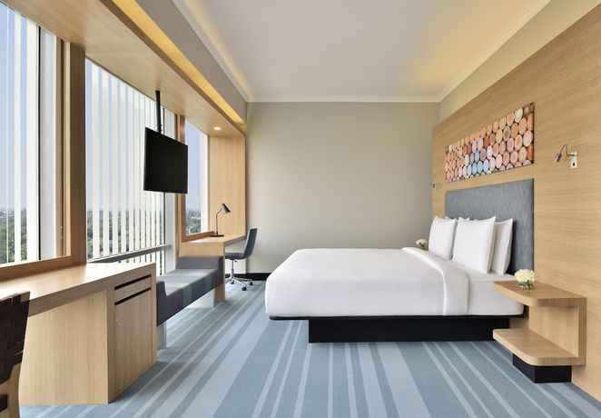 Imagen de la habitación del Hotel Aloft New Delhi Aerocity. Foto 13