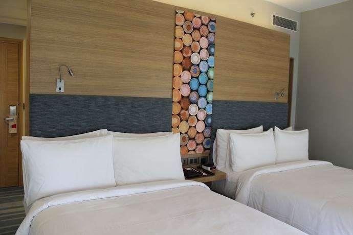 Imagen de la habitación del Hotel Aloft New Delhi Aerocity. Foto 16