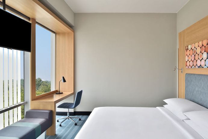 Imagen de los interiores del Hotel Aloft New Delhi Aerocity. Foto 20