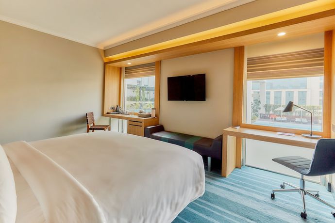 Imagen de la habitación del Hotel Aloft New Delhi Aerocity. Foto 18