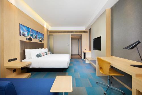 Imagen de la habitación del Hotel Aloft Shanghai Zhangjiang Haike. Foto 2
