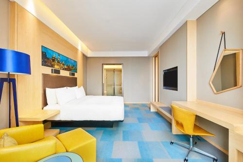 Imagen de la habitación del Hotel Aloft Shanghai Zhangjiang Haike. Foto 6