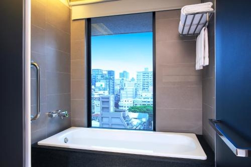 Imagen de la habitación del Hotel Aloft Taipei Zhongshan. Foto 5