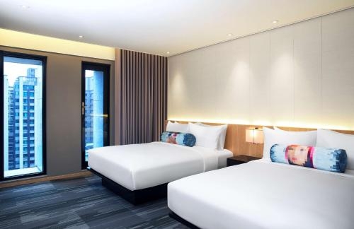 Imagen de la habitación del Hotel Aloft Taipei Zhongshan. Foto 6