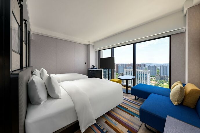 Imagen de la habitación del Hotel Aloft Yantai. Foto 12