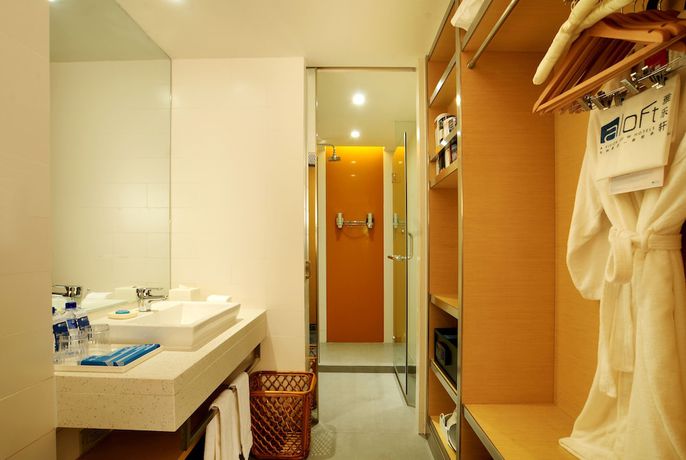 Imagen de la habitación del Hotel Aloft Zhengzhou Shangjie. Foto 14