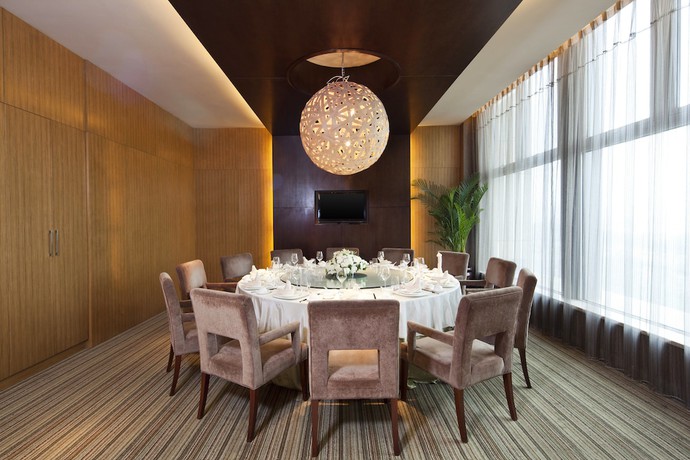 Imagen del bar/restaurante del Hotel Aloft Zhengzhou Zhengdong New District. Foto 6