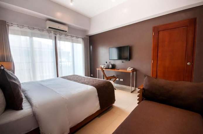 Imagen de la habitación del Hotel Aloha Boracay. Foto 15