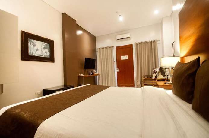 Imagen de la habitación del Hotel Aloha Boracay. Foto 18