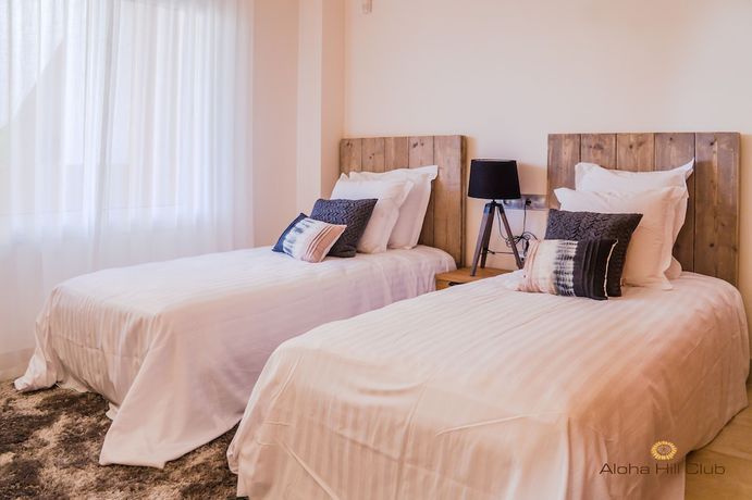 Imagen de la habitación del Hotel Aloha Hill Club Golf and Spa Apartments. Foto 7