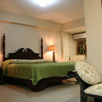 Imagen de la habitación del Hotel Aloha Sol. Foto 4