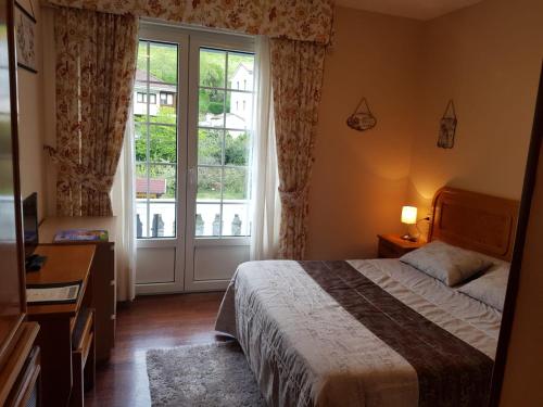 Imagen de la habitación del Hotel Alojamiento Calzada Romana. Foto 3