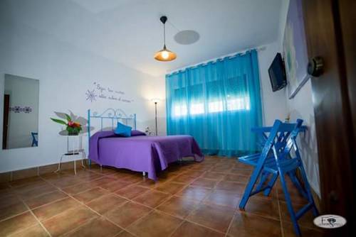 Imagen de la habitación del Hotel Alojamiento Rural El Charco Del Sultán. Foto 3