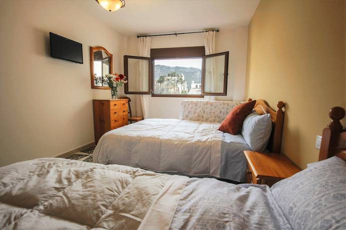 Imagen de la habitación del Hotel Alojamiento Rural El Tossal. Foto 3