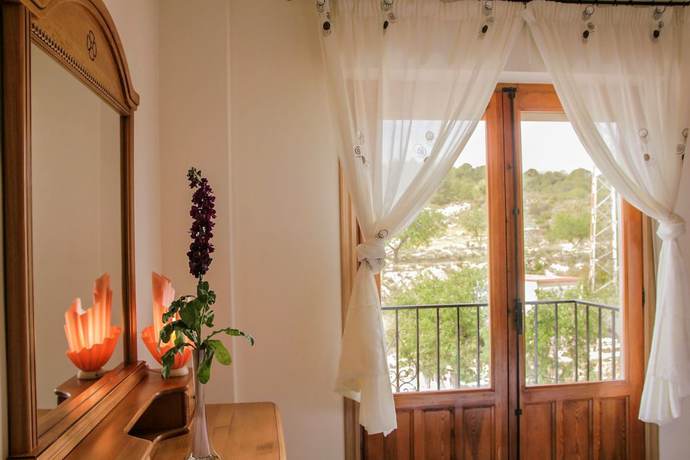 Imagen de la habitación del Hotel Alojamiento Rural El Tossal. Foto 5