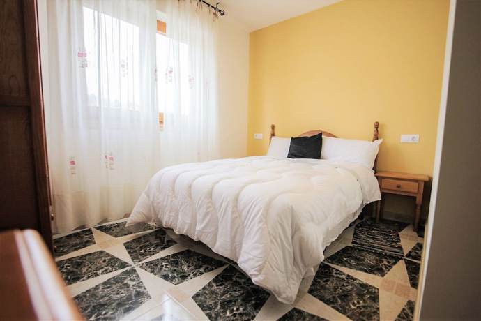 Imagen de la habitación del Hotel Alojamiento Rural El Tossal. Foto 13