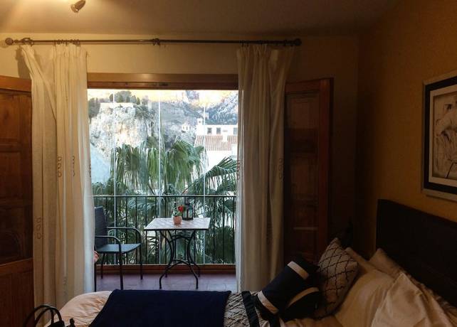 Imagen de la habitación del Hotel Alojamiento Rural El Tossal. Foto 14