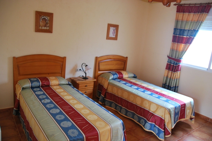 Imagen de la habitación del Hotel Alojamiento Rural Los Delfines. Foto 7