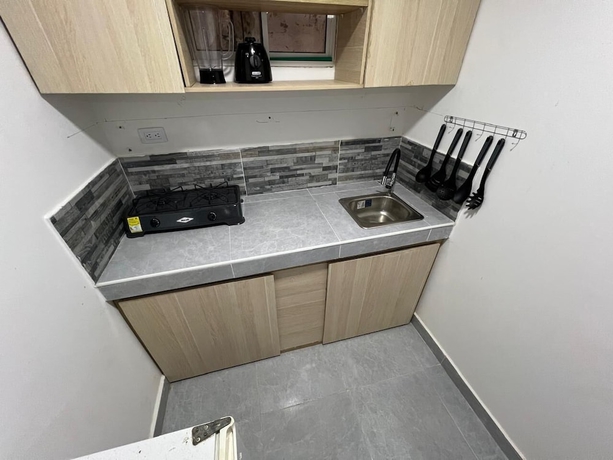 Imagen de la habitación del Hotel Alojamientos Town Beach. Foto 11