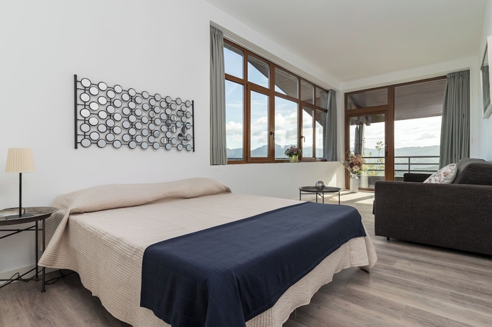 Imagen de la habitación del Hotel Alojamientos Tur&iacute;sticos LA APARECIDA. Foto 9